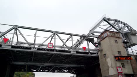 Crossing-under-the-metal-gate-of-the-sluice-in-Stockholm-Sweden