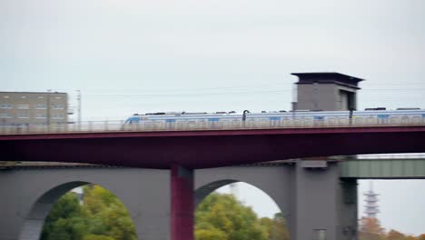 The-long-train-on-the-railtracks-on-the-top-in-Stockholm-Sweden