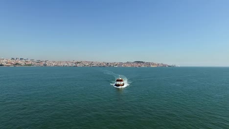 Aerial-from-ferry-boats-cruising-on-the-river-Tejo-near-Lisbon-Portugal