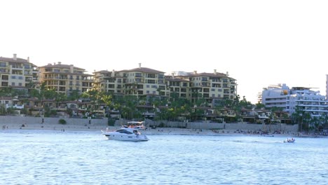 View-from-a-boat-of-buildings-and-tourists