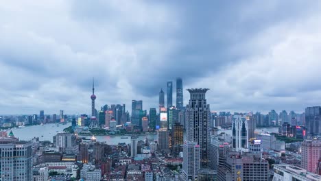 T/L-WS-HA-elevado-más-de-Shanghai-Bund-y-Lujiazui-de-oscuridad-a-la-noche