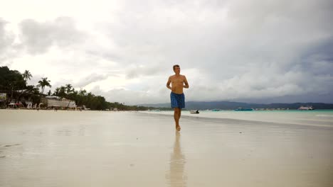 Man-running-on-the-beach