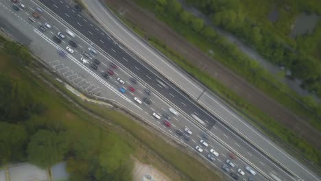 Aerial-Time-Lapse---Bird's-Eye-view-of-Traffic-moving-on-a-road