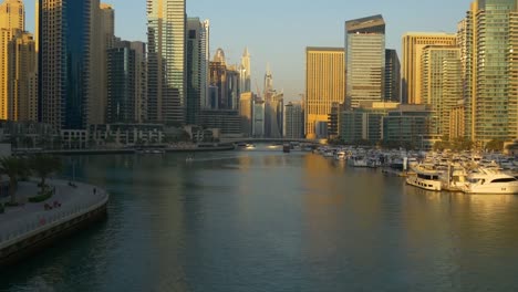 sunset-sun-light-dubai-marina-canal-yacht-dock-panorama-4k-united-arab-emirates