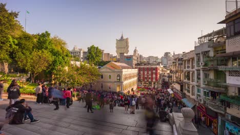 china-sunset-sun-macau-famous-ruins-crowded-steps-cityscape-panorama-4k-time-lapse