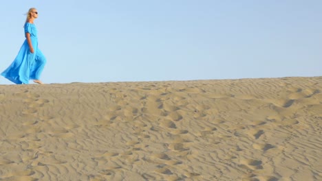 Woman-walking-on-beach-skyline