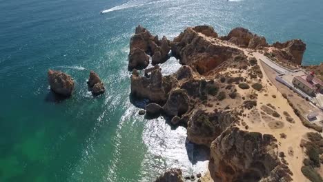 Aerial-view-of-Ponta-da-Piedade-rock-formations-in-Lagos,-Portugal