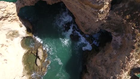 Aerial-view-of-Ponta-da-Piedade-rock-formations-in-Lagos,-Portugal