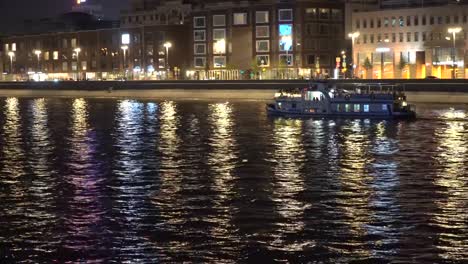 night-traffic-of-pleasure-boats-on-a-city-river