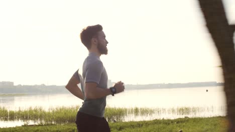 Athletic-Man-Running-at-Sunrise