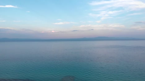 Aerial-view-of-Greek-village-by-the-sea-and-in-the-mountains