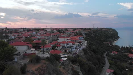 Aerial-view-of-Greek-village-by-the-sea-and-in-the-mountains