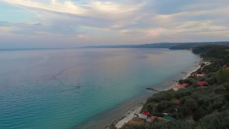 Aerial-view-of-Greek-village-by-the-sea-and-in-the-mountains