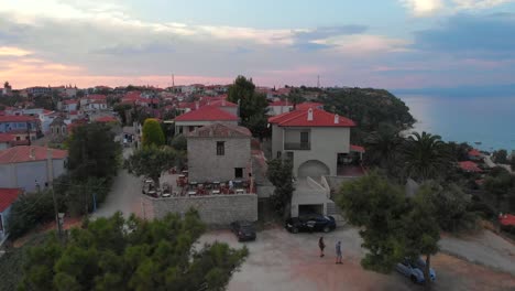 Aerial-view-of-Greek-village-by-the-sea-and-in-the-mountains