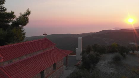 Aerial-view-of-Greek-village-by-the-sea-and-in-the-mountains