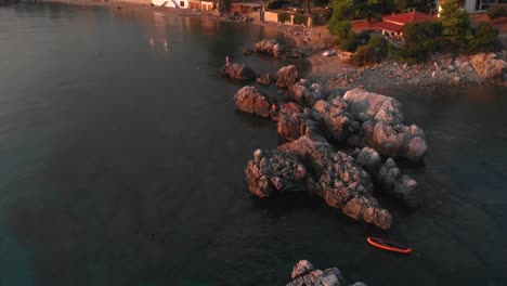 Aerial-view-of-Greek-village-by-the-sea-and-in-the-mountains