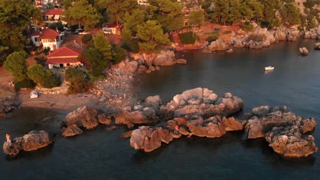 Aerial-view-of-Greek-village-by-the-sea-and-in-the-mountains