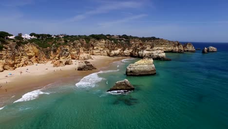 Aerial-from-natural-rocks-at-Praia-Tres-Irmaos-in-Alvor-Portugal