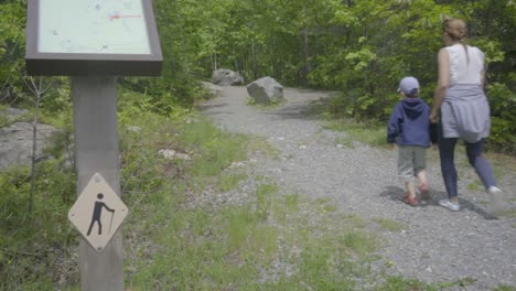 wilderness-forest-nature-lake-summer-woman-and-child-walking