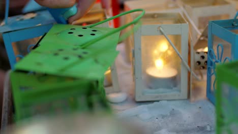 Lighting-candles-in-street-lanterns