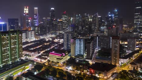 Time-lapse-Singapore-skyline-at-night-with-urban-buildings,-Downtown