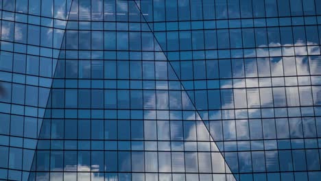 Time-lapse-of-clouds-reflecting-off-of-a-skyscraper-in-Chaoyang-district,-Beijing,-China-May-19th-2017-15:30