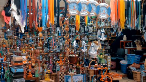 Selling-hookahs-at-old-city-market-in-Acre,-Israel