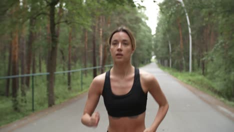 Fit-Sportswoman-Running-Outdoors