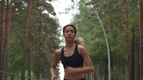 Determined-Woman-Jogging-in-Park