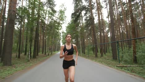 Young-Woman-Running-in-Forest