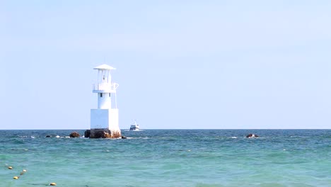 Lighthouse-in-the-ocean-with-blue-sky