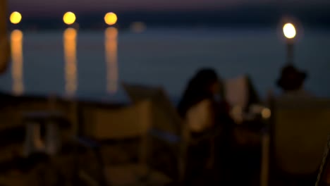 Beach-cafe-with-couple-in-the-evening