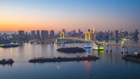 Day-to-Night-timelapse,-Tokyo-city-skyline-view-of-Tokyo-Harbor-in-Japan.,-Time-Lapse