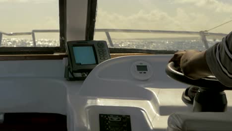 Captain-driving-yacht-in-the-sea