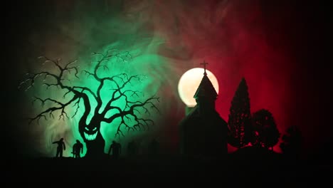 Scary-view-of-zombies-at-cemetery-dead-tree,-moon