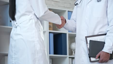 Two-Medical-Researchers-Shaking-Hands