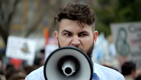 Human-on-the-background-of-the-crowd-on-the-revolution.-office-worker-4k.