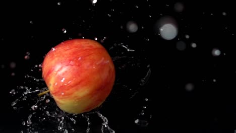 Apple-falls-in-water.-Slow-motion.