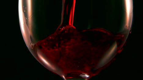 Macro-shot-of-red-wine-into-glass