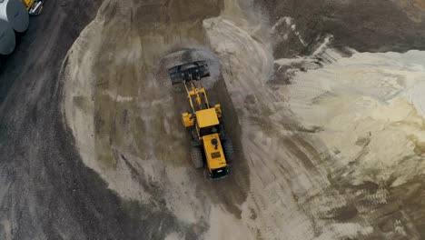 Asphalt-Concrete-Plant-With-Running-Bulldozer.-Aerial-View.