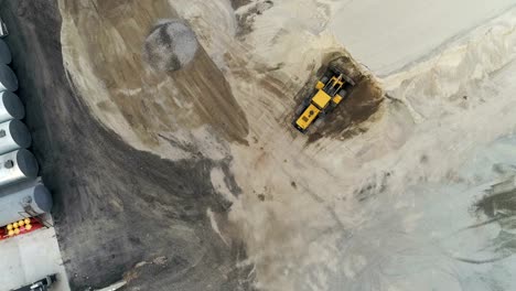 Asphalt-Concrete-Plant-With-Running-Bulldozer.-Aerial-View.