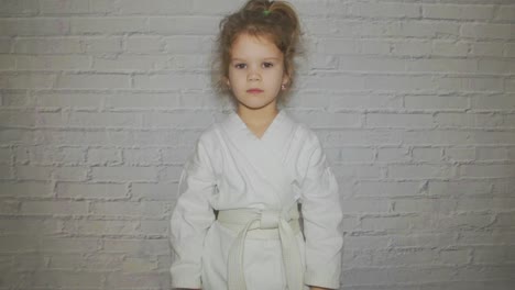 girl,-child-in-a-kimono-makes-a-greeting