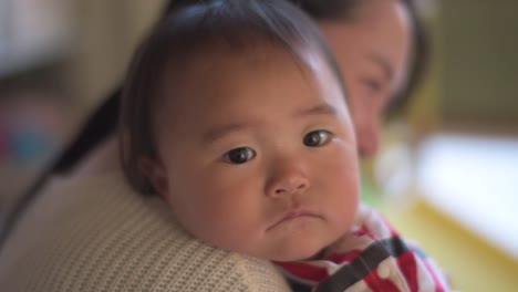 Child-hugged-by-mother