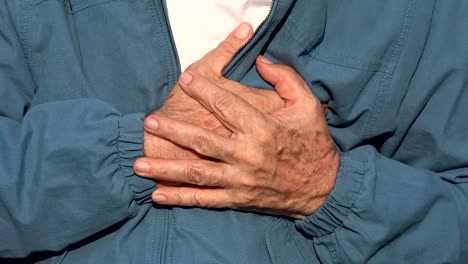 Elderly-Man-With-Heart-Attack-Or-Chest-Pain