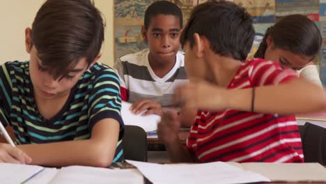 Friends-Cheating-During-Test-At-School-And-Students-Studying