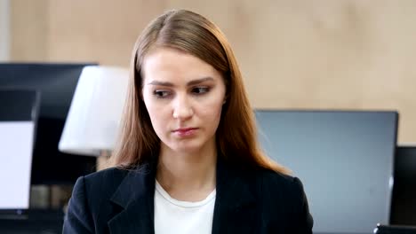 Portrait-of-Upset-Sad-Woman-in-Office