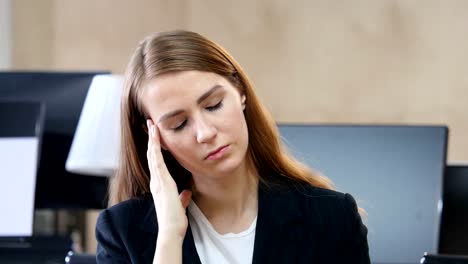 Headache,-Upset-Tense-Woman-in-Office