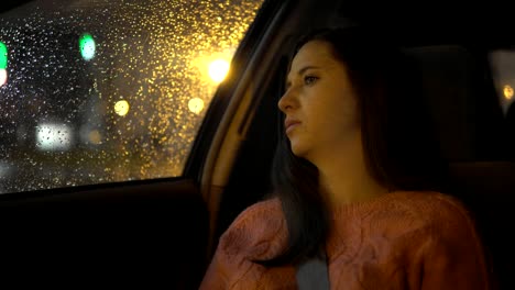 A-frustrated-woman-is-sitting-in-the-car-in-the-evening.