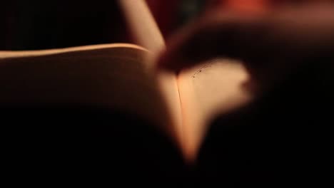 Close-Up-of-Leafing-Through-a-Tattered-Old-Bible