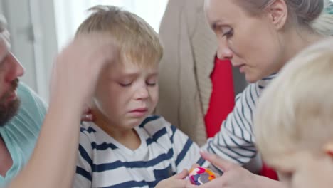 Mother-and-Father-Calming-Crying-Kid